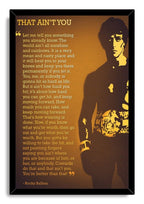 Rocky Balboa framed wall art print with a black border, boxer silhouette, championship belt, and gold motivational text.
