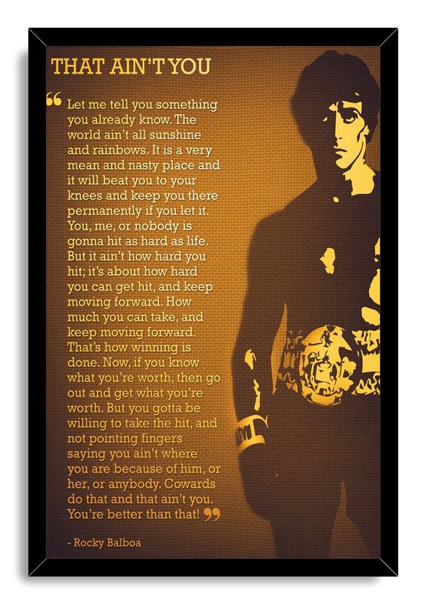 Rocky Balboa framed wall art print with a black border, boxer silhouette, championship belt, and gold motivational text.