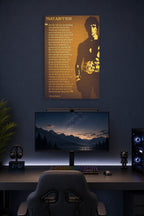 Rocky Balboa in a gaming desk setup above a monitor.