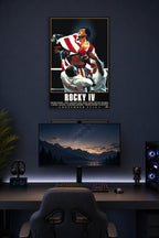 Rocky Balboa in a gaming desk setup above a monitor.