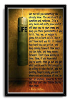 Rocky Balboa motivational framed wall art print with a black frame, hanging green punching bag, and inspirational quote in black lettering.