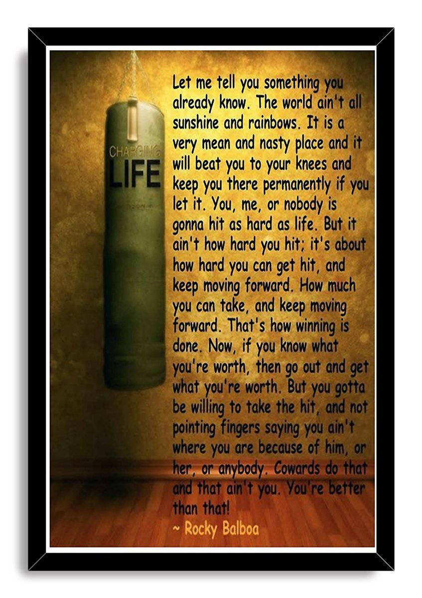Rocky Balboa motivational framed wall art print with a black frame, hanging green punching bag, and inspirational quote in black lettering.