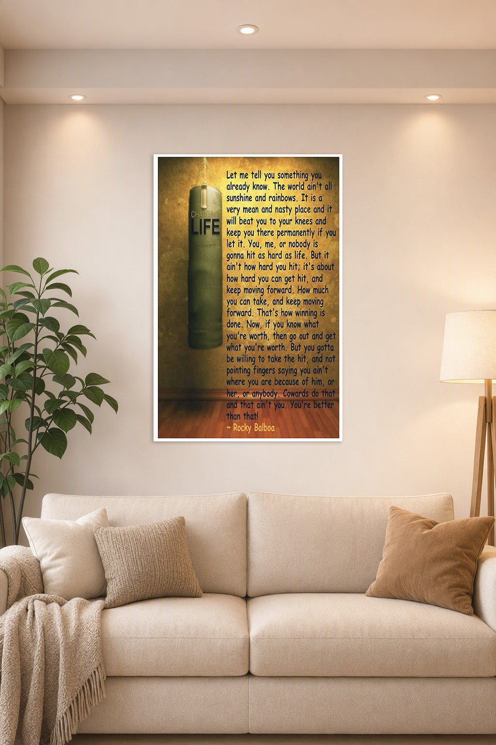 Rocky Balboa Motivational Quote in a bright living room above a beige sofa.