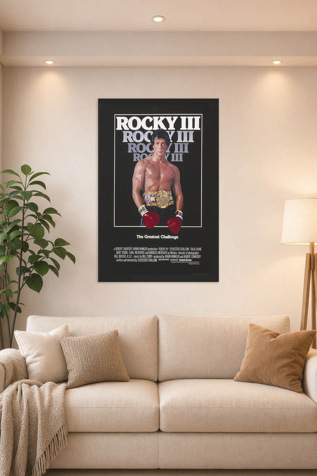 Rocky Balboa Rocky III in a bright living room above a beige sofa.