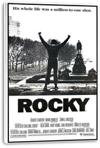 Rocky canvas wall art print with wrapped edges, featuring the black-and-white victory silhouette, tree-lined scene, and large ROCKY lettering.