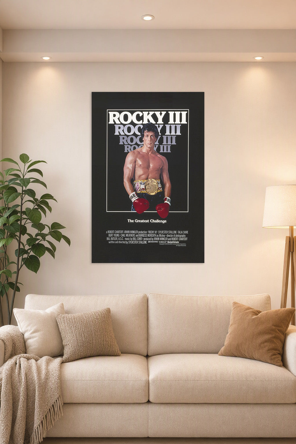 Rocky III Sylvester Stallone in a bright living room above a beige sofa.