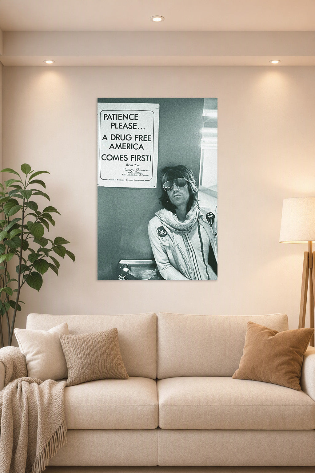 Rolling Stones Keith Richards in a bright living room above a beige sofa.