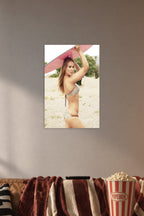Ronda Rousey in a cozy movie room above a brown sofa with popcorn.