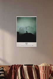 Rosemary's Baby Movie Poster in a cozy movie room above a brown sofa with popcorn.