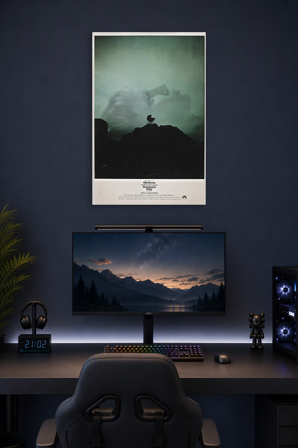Rosemary's Baby Movie Poster in a gaming desk setup above a monitor.