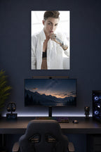 Ruby Rose in a gaming desk setup above a monitor.