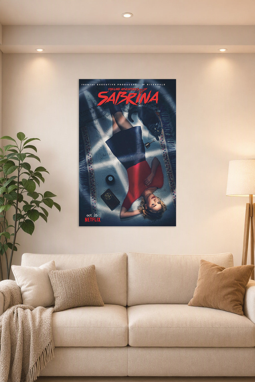 Sabrina Spellman Chilling Adventures in a bright living room above a beige sofa.