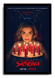 Sabrina Spellman framed wall art print features a blonde woman behind glowing red candles, silhouetted horns, and a black frame.