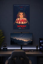 Sabrina Spellman Chilling Adventures of Sabrina in a gaming desk setup above a monitor.