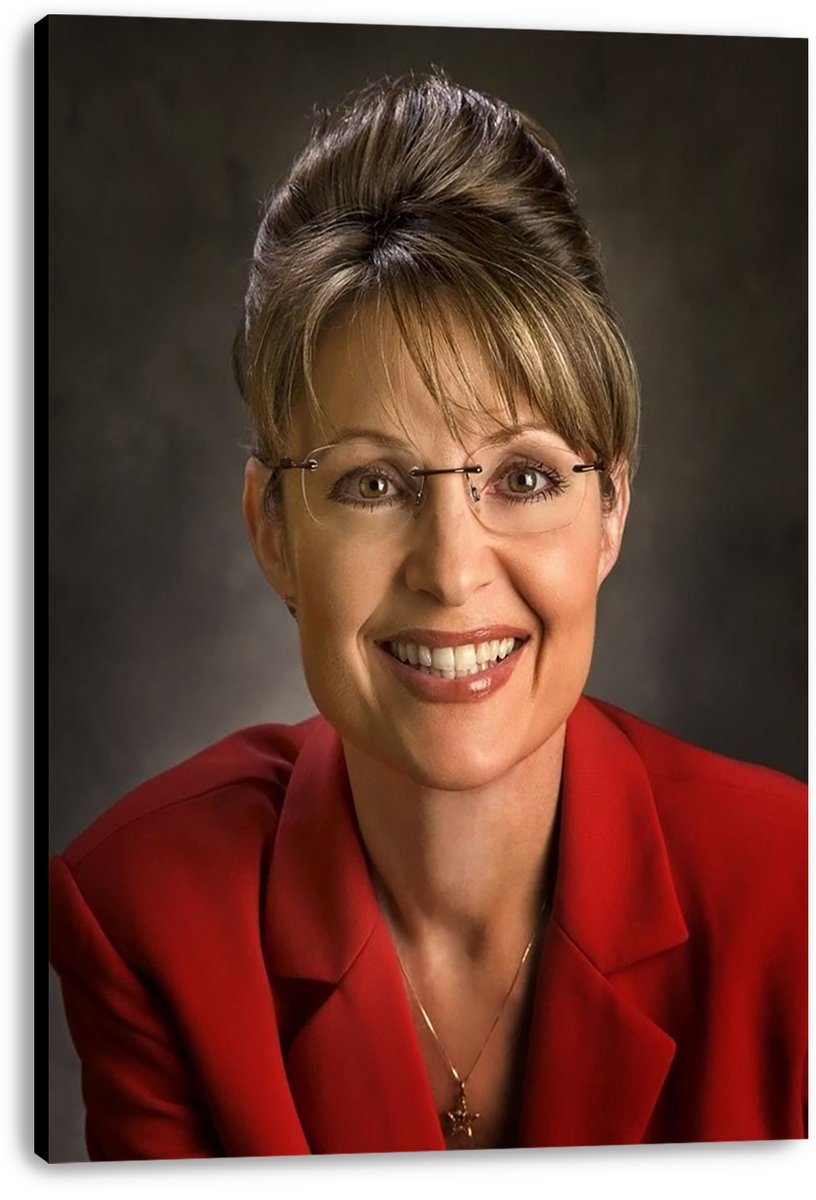 Sarah Palin canvas wall art print displays her smiling portrait with glasses, red blazer, and dark gray studio backdrop.