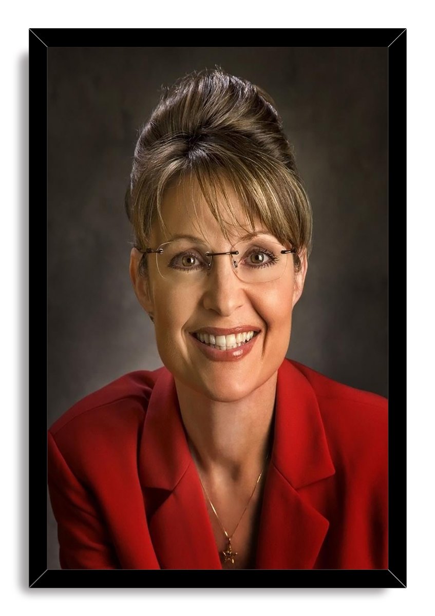 Sarah Palin framed wall art print presents a smiling portrait in glasses and a red blazer within a sleek black frame.