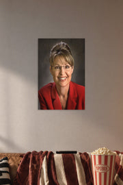 Sarah Palin in a cozy movie room above a brown sofa with popcorn.
