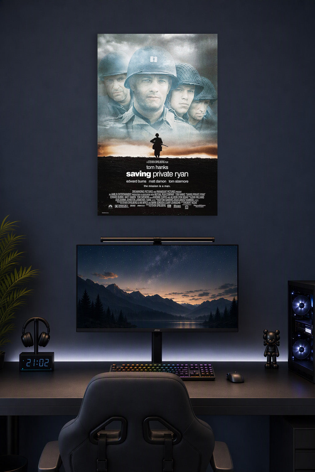 Saving Private Ryan Movie Poster in a gaming desk setup above a monitor.