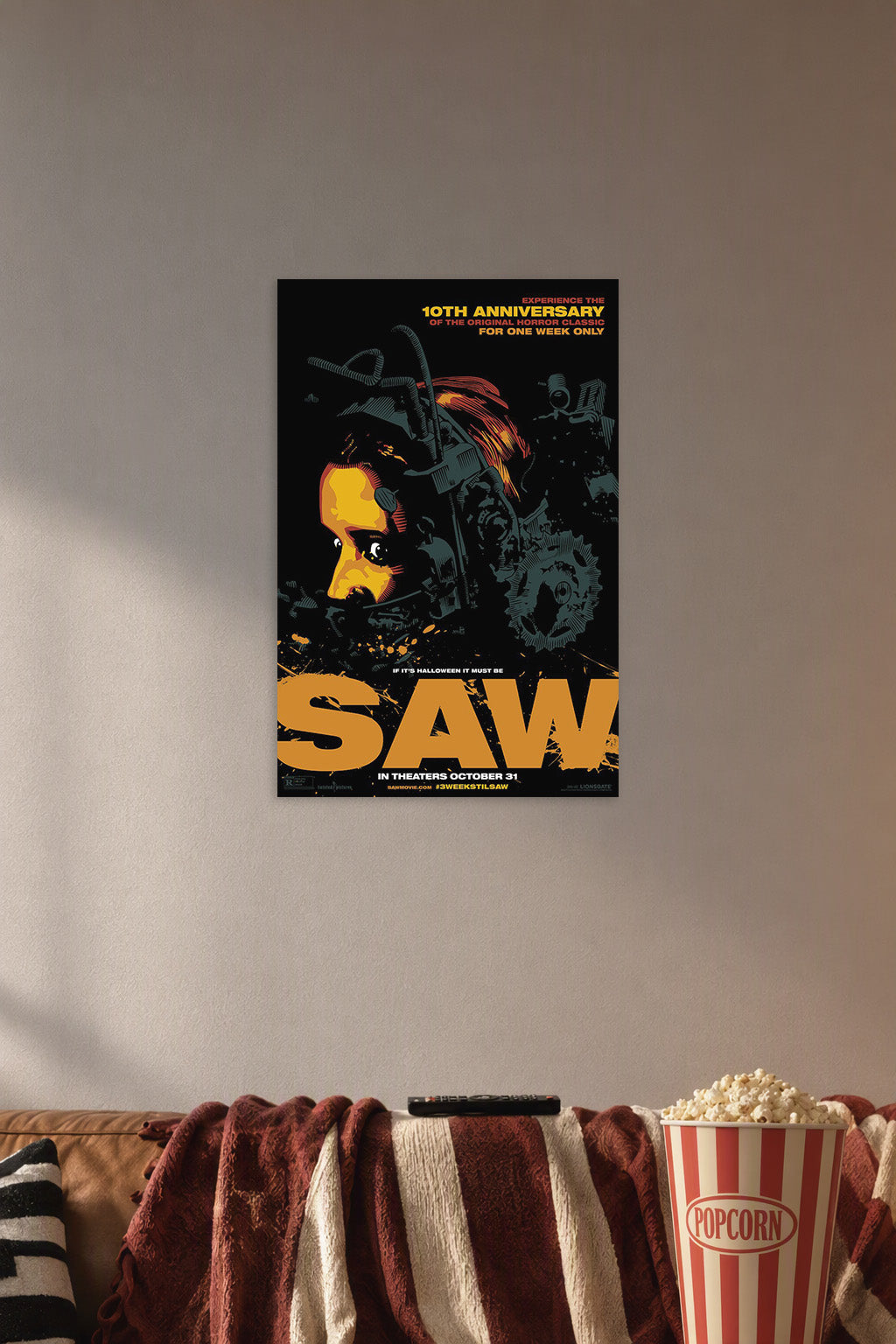 Saw Movie Horror Film in a cozy movie room above a brown sofa with popcorn.