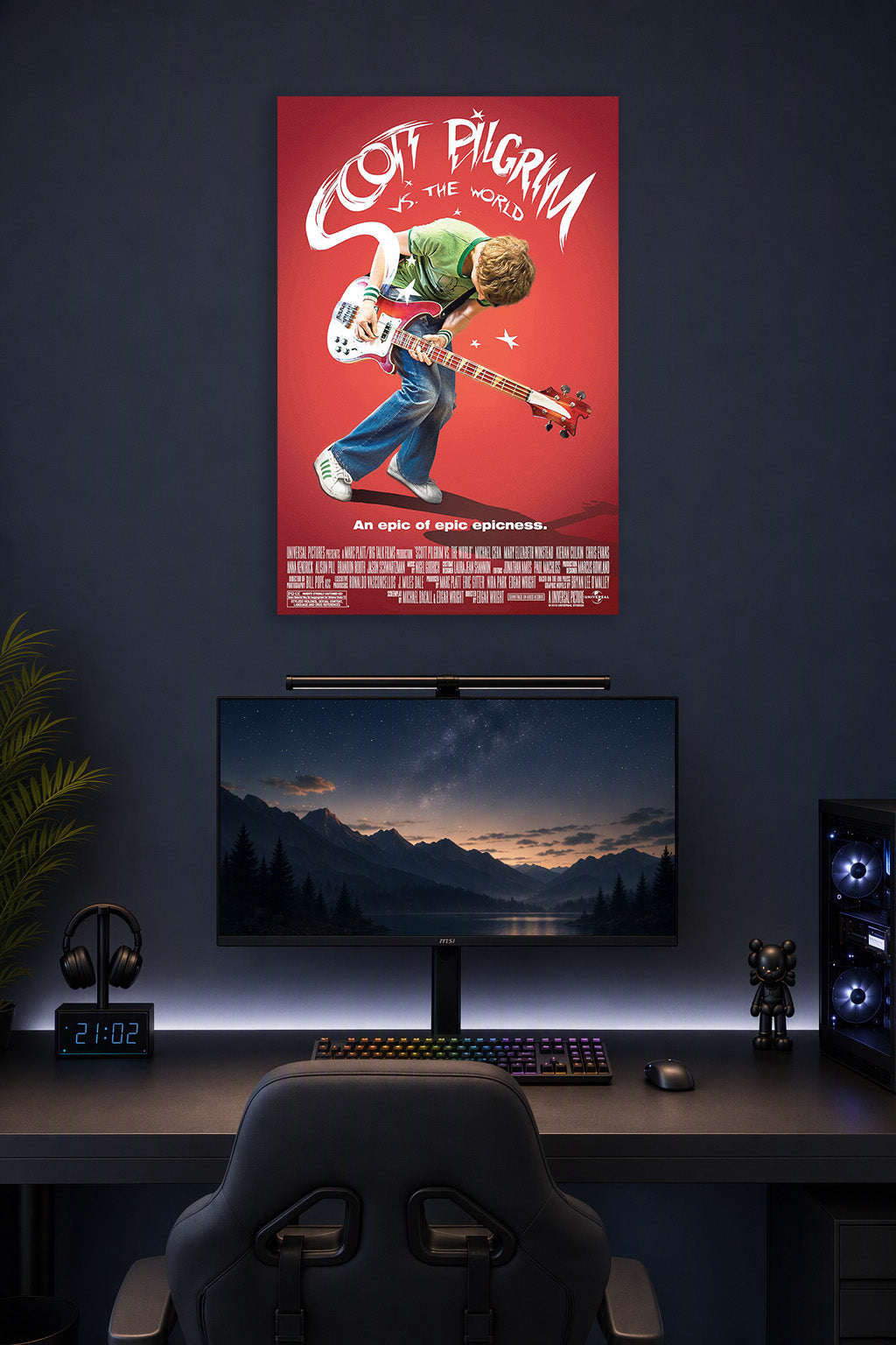Scott Pilgrim vs. The World Movie Poster in a gaming desk setup above a monitor.