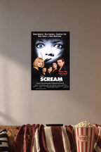 Scream Movie in a cozy movie room above a brown sofa with popcorn.