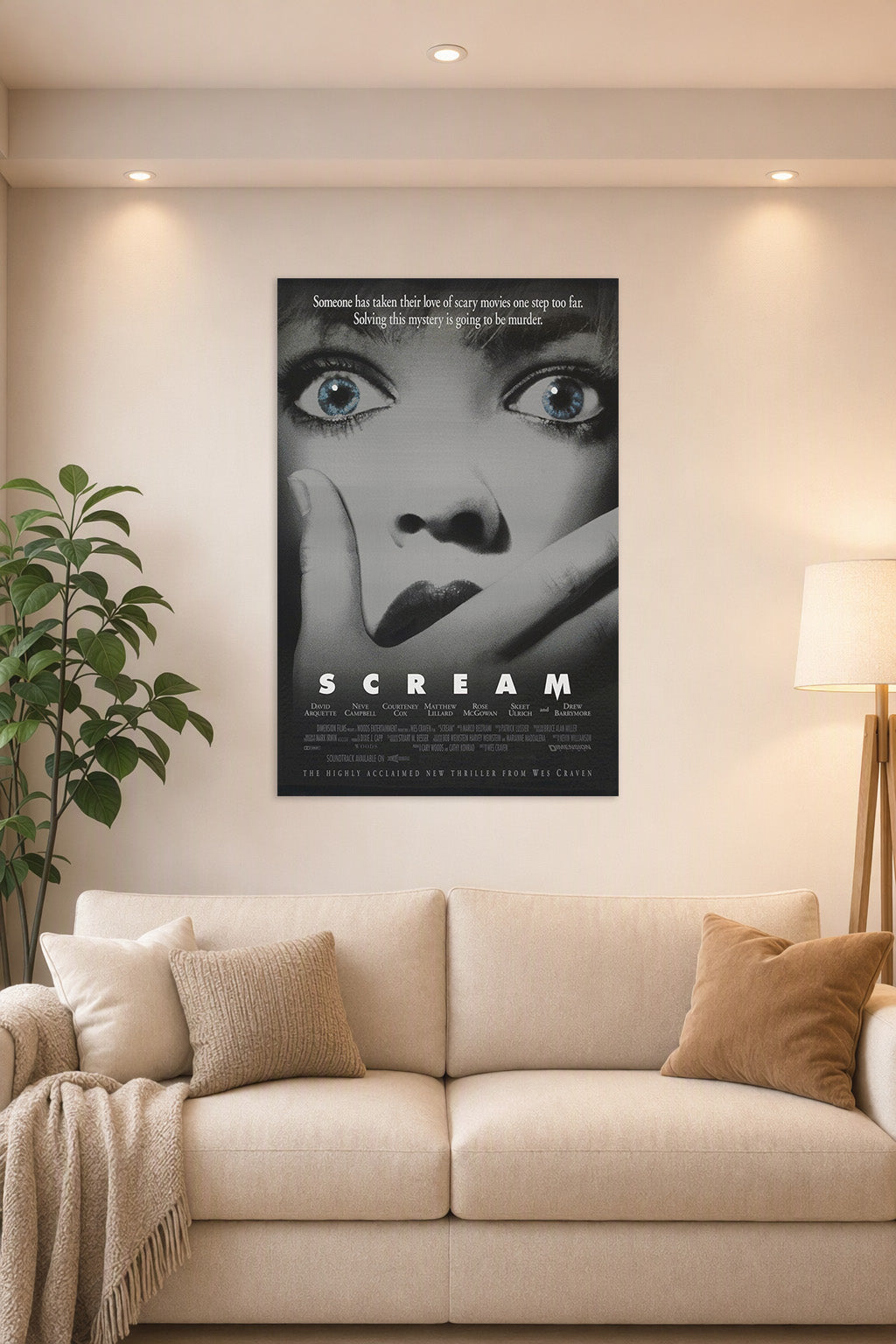Scream Movie Poster in a bright living room above a beige sofa.