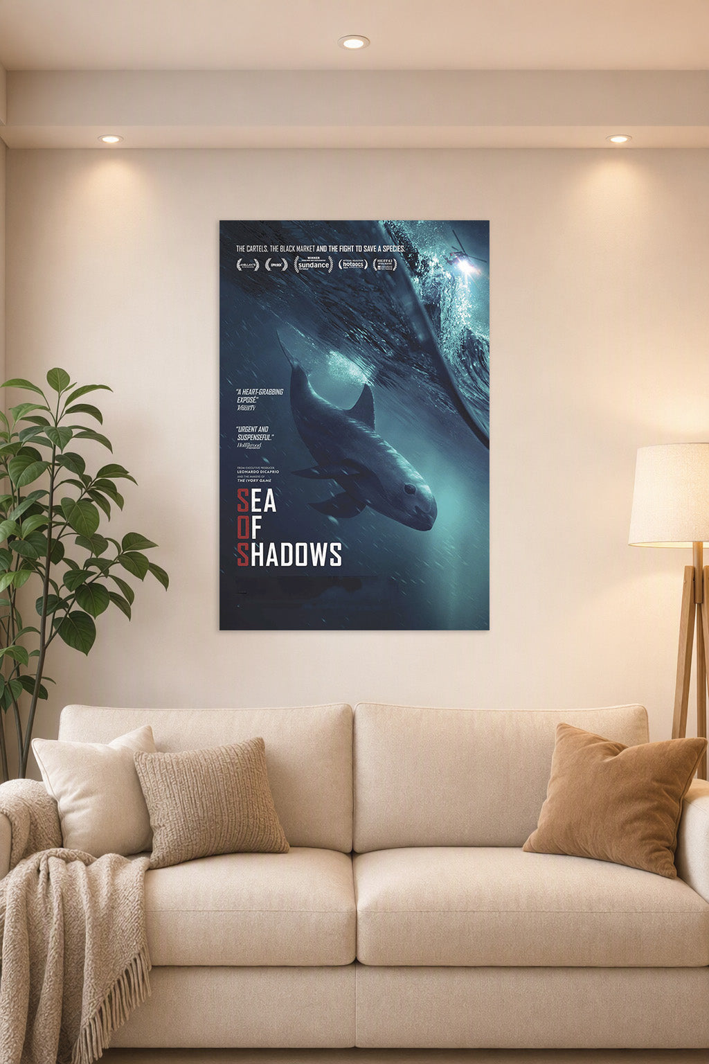 Sea of Shadows Vaquita in a bright living room above a beige sofa.