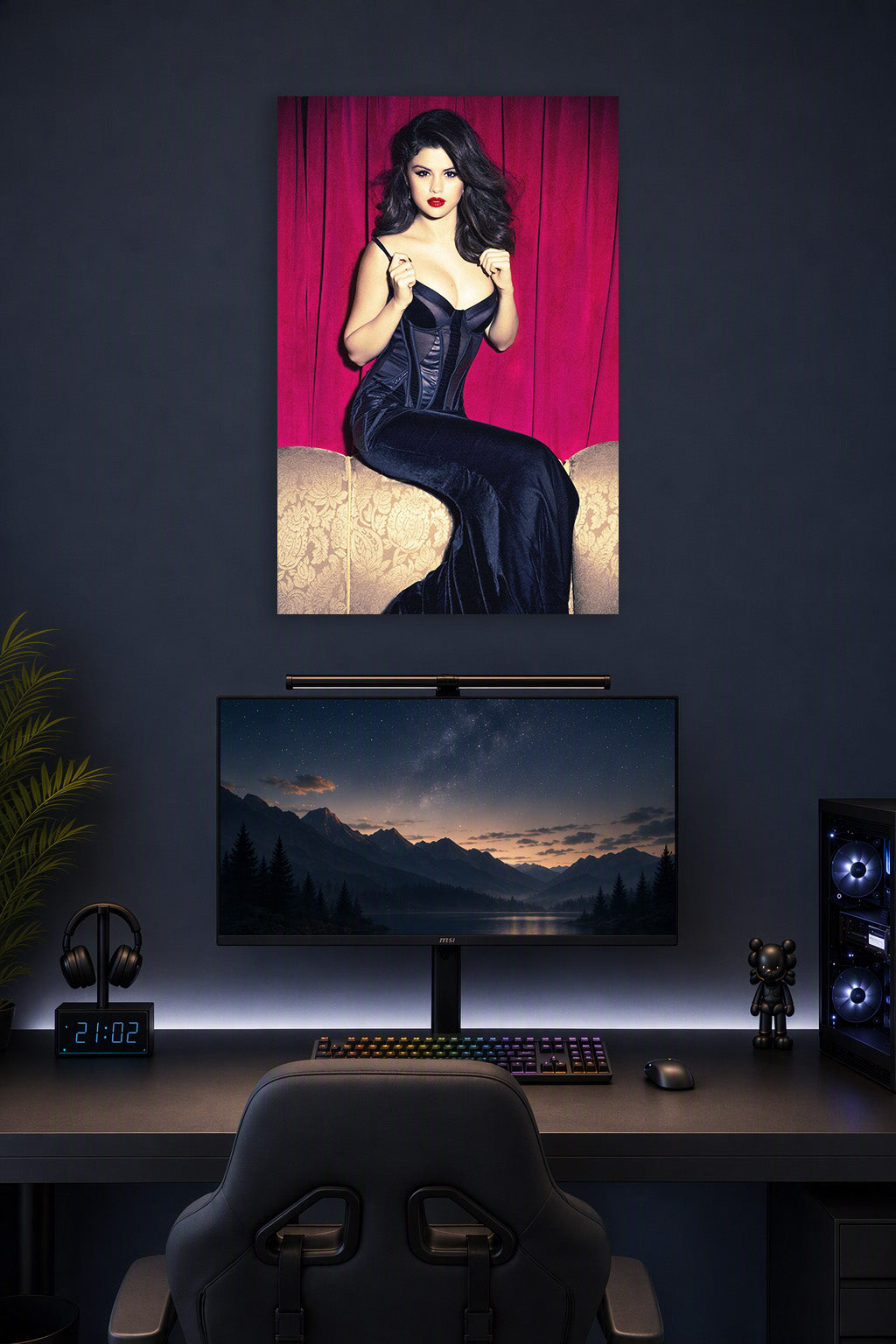 Selena Gomez in a gaming desk setup above a monitor.