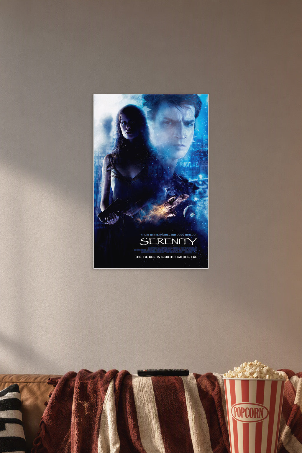 Serenity Movie in a cozy movie room above a brown sofa with popcorn.