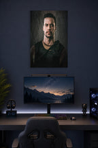 Serious Man in Tactical Gear in a gaming desk setup above a monitor.