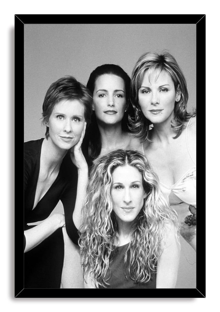 Sex and the City cast framed wall art print featuring a black-and-white four-woman portrait in a sleek black frame.