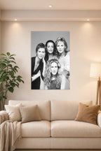 Sex and the City Cast Black and White in a bright living room above a beige sofa.