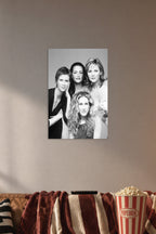 Sex and the City Cast Black and White in a cozy movie room above a brown sofa with popcorn.