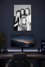 Sex and the City Cast Black and White in a gaming desk setup above a monitor.