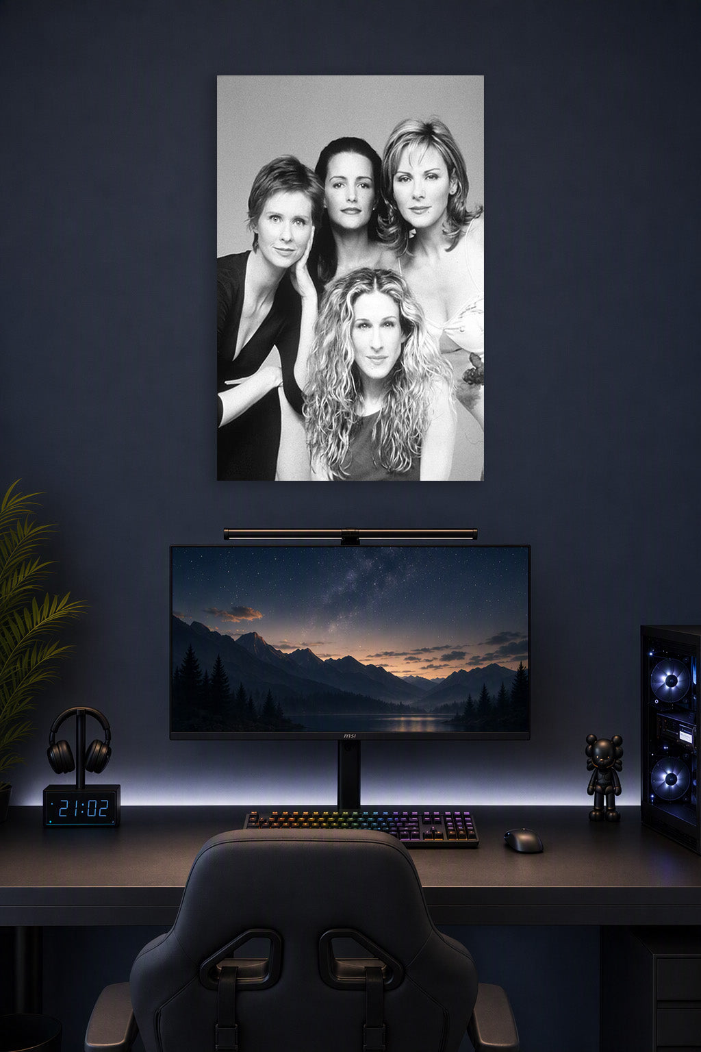 Sex and the City Cast Black and White in a gaming desk setup above a monitor.