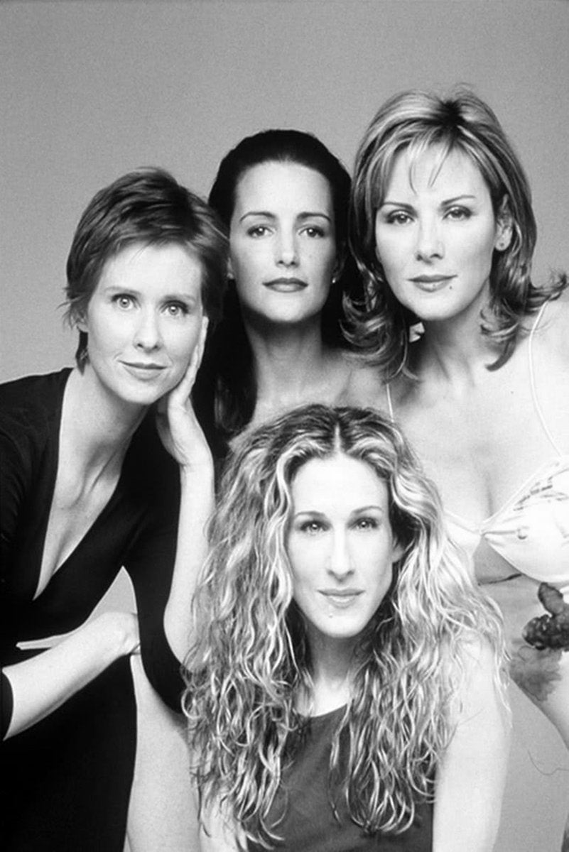 Sex and the City cast wall art print with four women posed in a close black-and-white studio portrait.