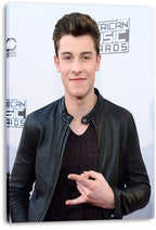Shawn Mendes canvas wall art print with a smiling portrait in a black jacket before an American Music Awards logo wall.