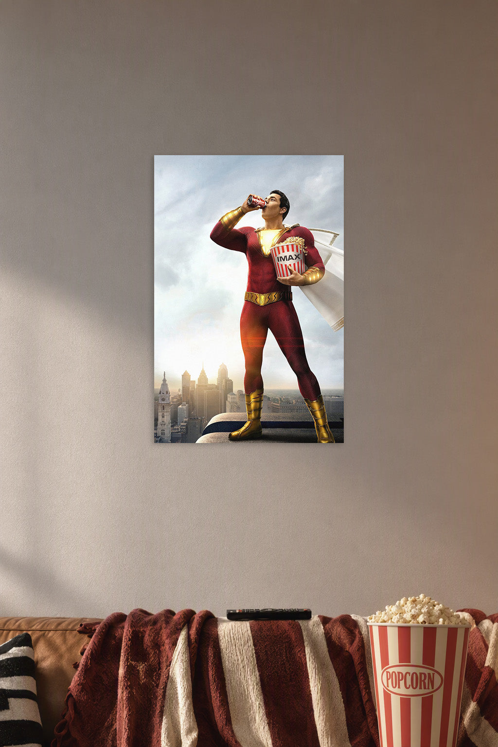 Shazam! in a cozy movie room above a brown sofa with popcorn.