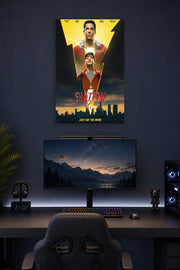 Shazam! Movie in a gaming desk setup above a monitor.