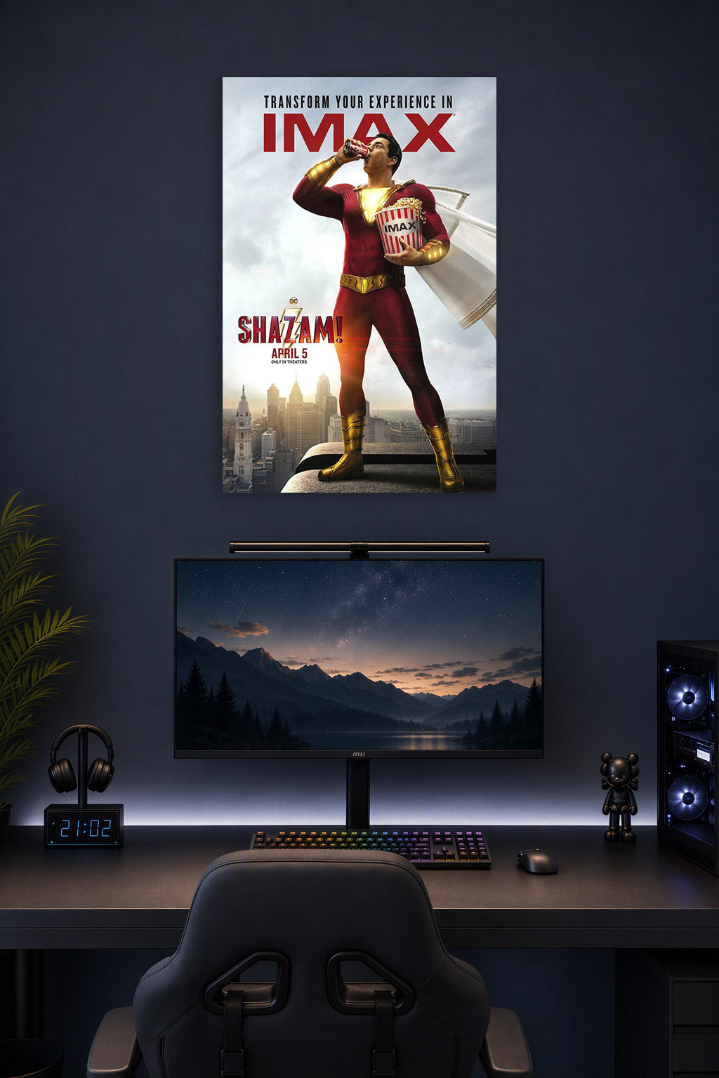 Shazam Movie Poster in a gaming desk setup above a monitor.