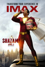 Shazam movie poster wall art print depicts the red-suited hero drinking from a can and holding popcorn above a city skyline.