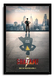 Shazam movie poster wall art print in a black frame, featuring a boy, city skyline, and superhero shadow with yellow bolt.