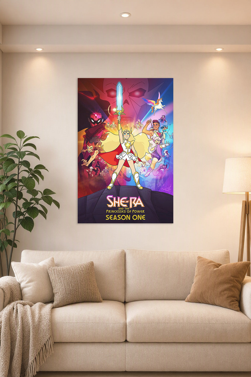 She-Ra and the Princesses of Power in a bright living room above a beige sofa.
