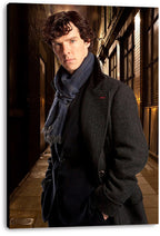 Sherlock Holmes canvas wall art print features the detective in a charcoal overcoat and blue scarf against a shadowy brick alley.