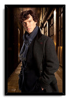 Sherlock Holmes framed wall art print depicts a serious man in a textured dark coat and blue scarf in a dim urban passage.
