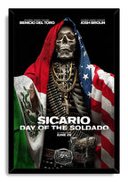 Sicario: Day of the Soldado framed wall art print presents a skeleton in Mexican and American flags with gold jewelry and ammunition.