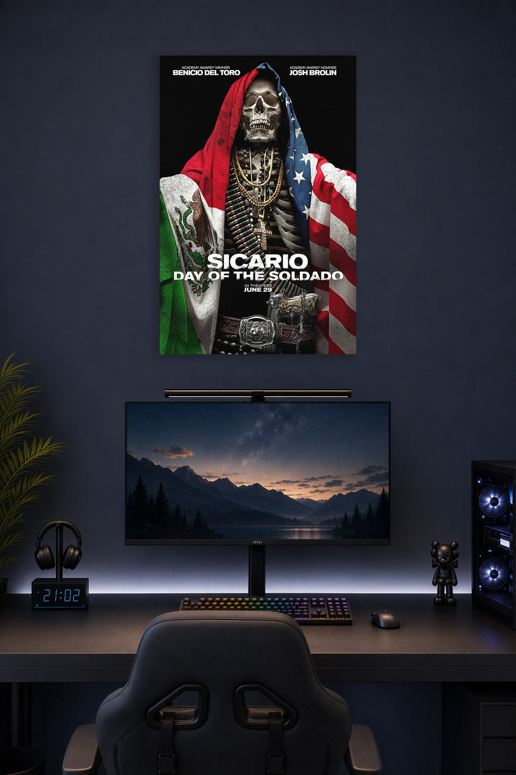 Sicario Day of the Soldado Movie Poster in a gaming desk setup above a monitor.