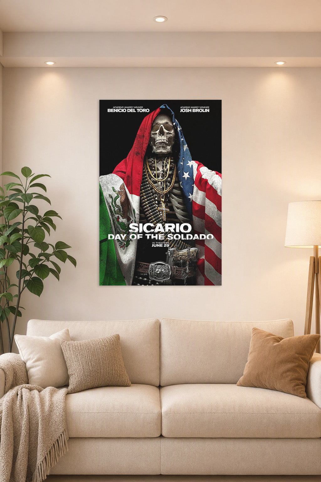 Sicario Day of the Soldado Movie Poster in a bright living room above a beige sofa.