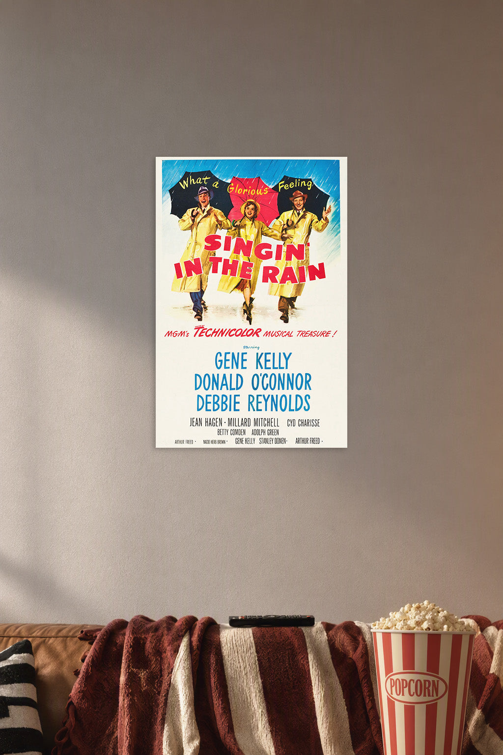 Singin' in The Rain Movies in a cozy movie room above a brown sofa with popcorn.