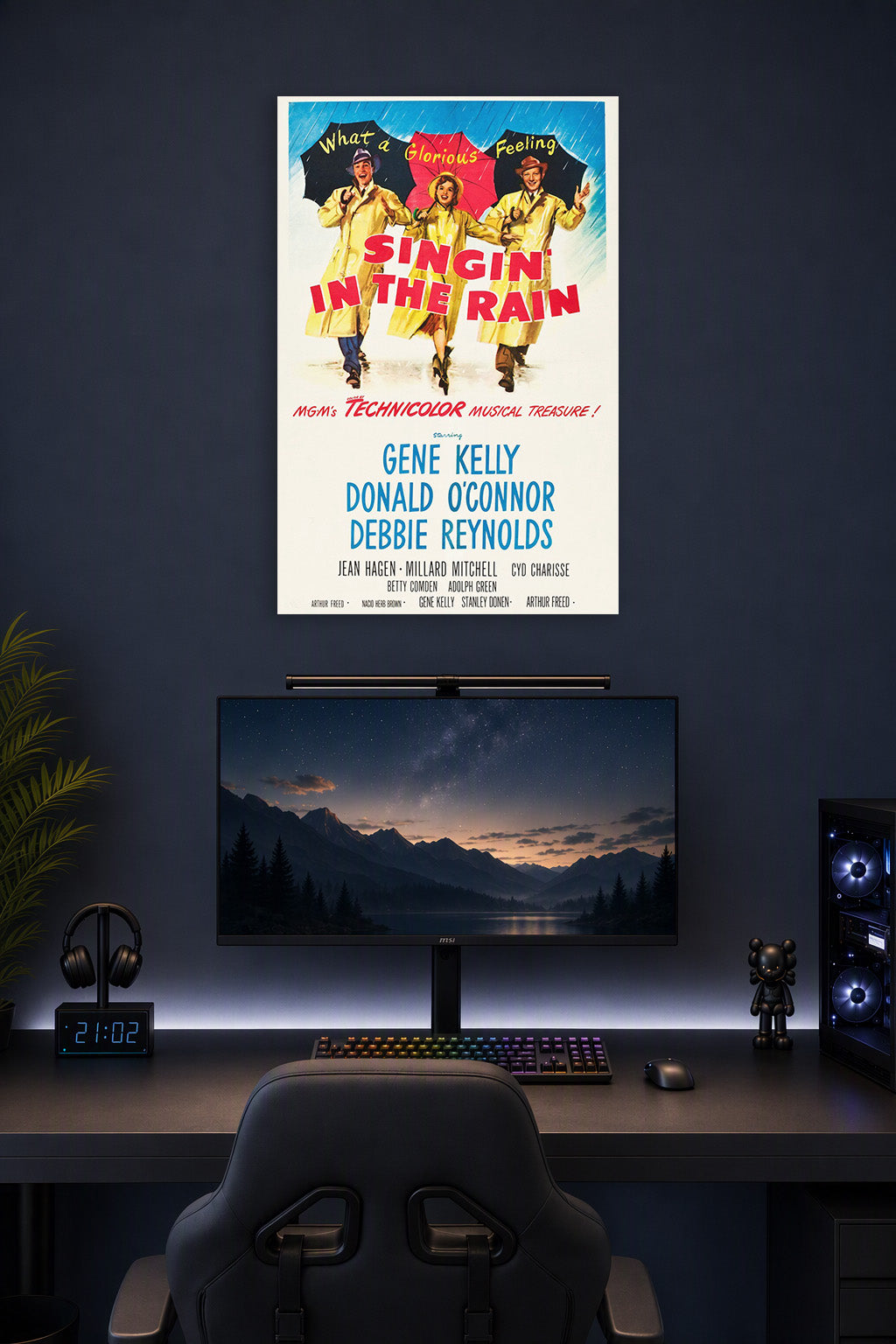 Singin' in the Rain Movie Poster in a gaming desk setup above a monitor.
